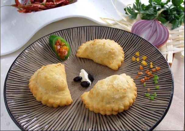 Cuisine Innovations Beef Empanada -- 100 per case.