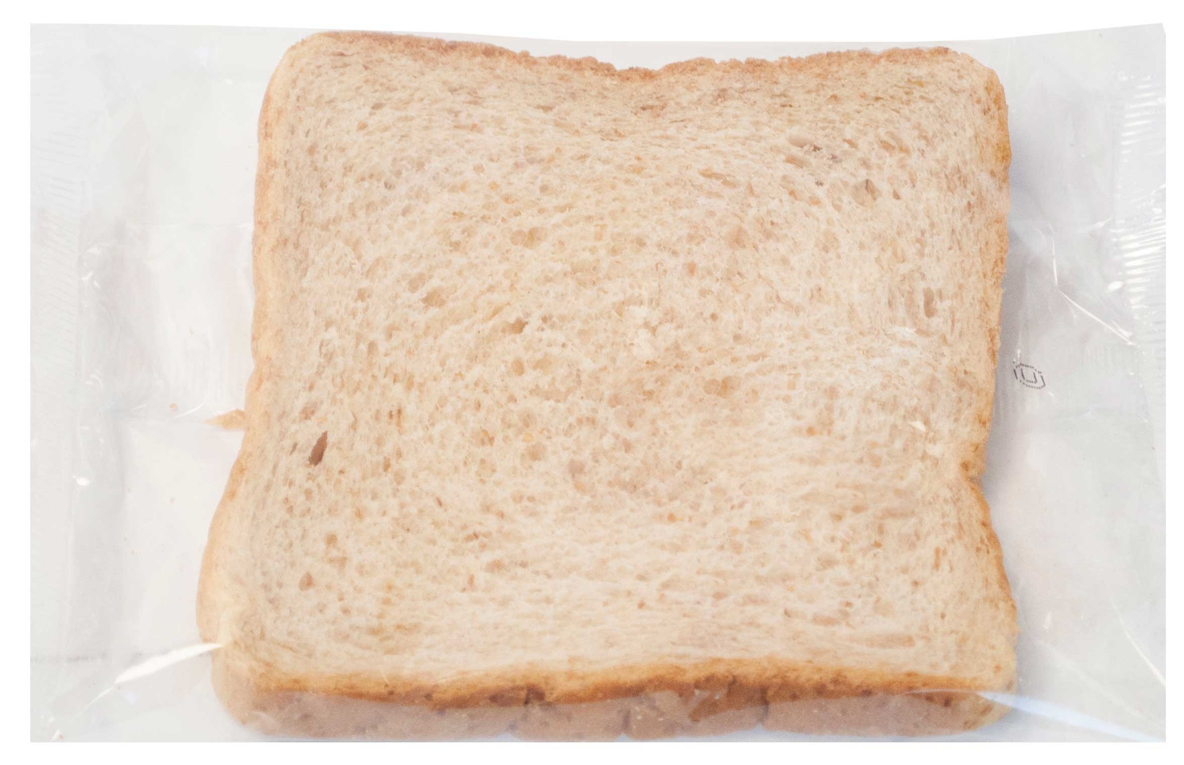 Alpha Baking Individually Wrapped Wheat Slice Bread, 1 Ounce -- 96 per case