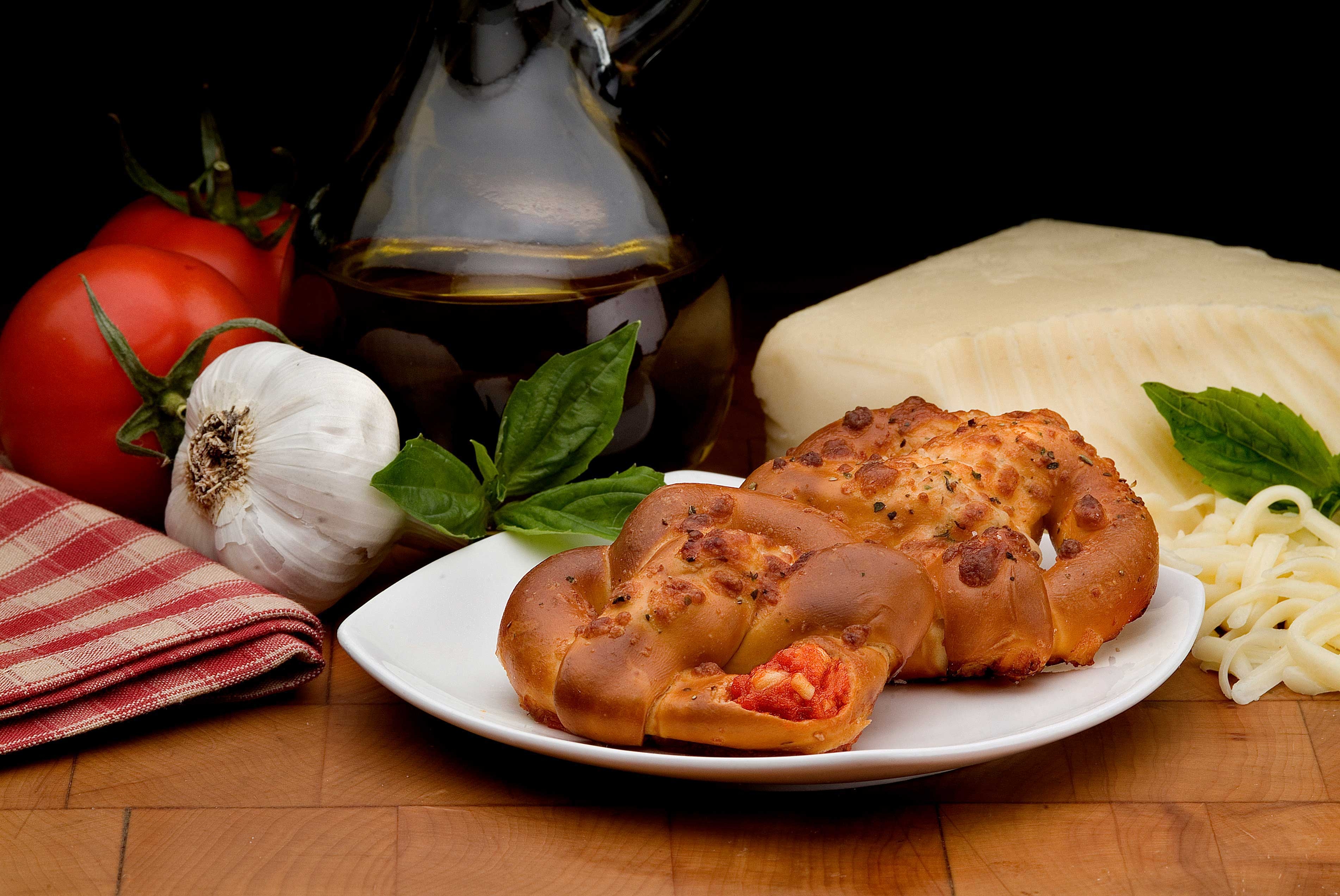 Kim and Scotts Pizza Stuffed Pretzels, 6 Ounce -- 24 per case.